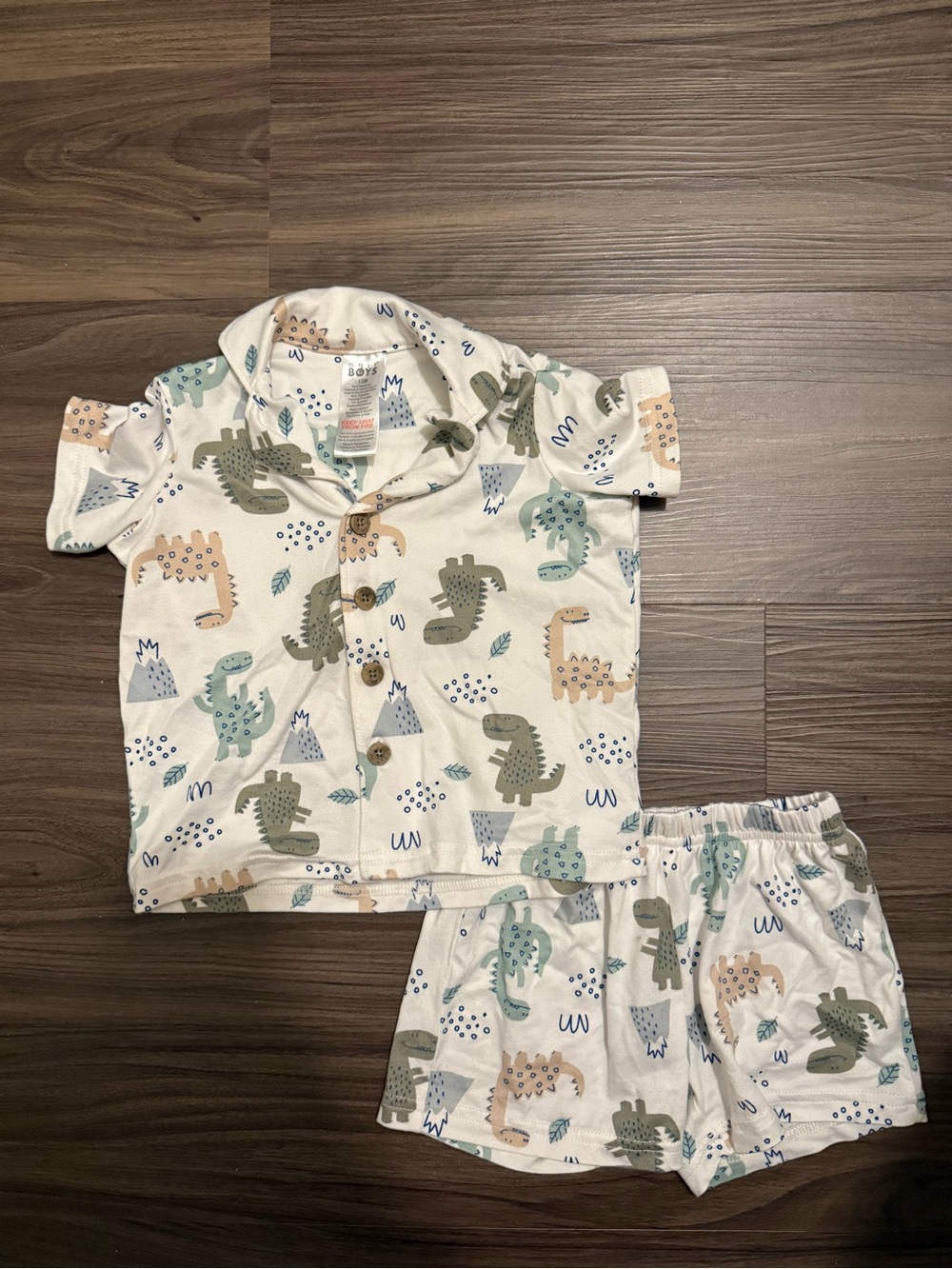 Only Boys Cream Pajama Set with Green, Blue & Tan Dinosaur Print size 12M